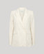 Front view of the fitted double breasted Corine Stripe Cotton Linen Jacket In Taupe.