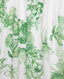 Close-up of the Flora Full A-line Midi Skirt In Tropical Green.