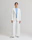 Model wearing the Elizabeth Linen Jacket in White with matching Elizabeth trousers in White.