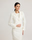 Model wearing Really Wild's cropped Meryl Cute Fitted Jacket In White