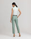Model wearing the Jackie Wool Silk Turn-up Trousers in sea green—a modern take on traditional country wear, crafted from a luxurious blend of wool, silk, and linen, designed to stand out on a cold winter's day. Back view paired with the Jackie Wool Silk Jacket.
