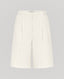 Front view of the Corine Tailored Stripe Shorts in Taupe with pleat details at the front.
