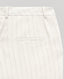 Back view close-up of the Corine Stripe Linen Trousers In Taupe, featuring its belt loops and welt pocket detail.