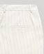 Back view close-up of the Corine Stripe Linen Trousers In Taupe, featuring its belt loops and welt pocket detail.