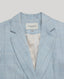 Close-up of the Tania Wool Blend Jacket in Blue Check, featuring the notched lapel and cream lining.