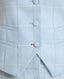 Close-up of the Tania Wool Blend Waistcoat In Blue Check featuring covered button and bottom stitch in orange contrast.