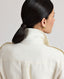 Back view of model wearing the Meryl Shirt Dress In White showing the upturned collar with tonal embroidered Really Wild logo.