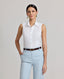 Model wearing the Eva Sleeveless Collared Shirt in white—a versatile, sleeveless shirt with a classic collar, designed for effortless layering and suitable for any occasion. Front view.