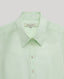 Detail of pointed collar and white buttons of the Eva Sleeveless Collared Shirt in aqua marine.