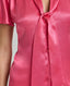 Neck tie detail of the Celeste Tie Neck Liberty Silk Top In Coral. A V-neck blouse with tulip sleeves and a detachable 175cm tie at neck.