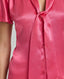 Neck tie detail of the Celeste Tie Neck Liberty Silk Top In Coral. A V-neck blouse with tulip sleeves and a detachable 175cm tie at neck.