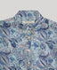 Collar and white button details of the Sophia shirt in blue made from 100% Liberty silk chiffon.