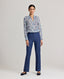 Front view of model wears the relaxed Sophia shirt in blue made from 100% Liberty silk chiffon with the Jackie denim trousers.