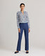 Front view of model wears the relaxed Sophia shirt in blue made from 100% Liberty silk chiffon with the Jackie denim trousers.