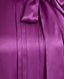 Close-up of model wearing the Nicole Liberty Silk Tie Neck Blouse In Amethyst, featuring the pleat detail.