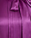 Close-up of model wearing the Nicole Liberty Silk Tie Neck Blouse In Amethyst, featuring the pleat detail.