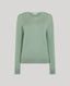 Front view of the Sadie Crew Neck Jumper In Sage - Made from 100% merino wool, our Sadie Crew Neck is both practical and stylish, and is perfect for layering throughout the year. Designed in an elegantly understated sage green, this is a wardrobe staple for everyday wear. Rib detailing at the hem and cuff adds a feminine touch and the fine knit blends luxury with durability.