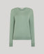 Front view of the Sadie Crew Neck Jumper In Sage - Made from 100% merino wool, our Sadie Crew Neck is both practical and stylish, and is perfect for layering throughout the year. Designed in an elegantly understated sage green, this is a wardrobe staple for everyday wear. Rib detailing at the hem and cuff adds a feminine touch and the fine knit blends luxury with durability.