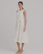 Video of model wearing the Meryl Fitted Skater Dress In White.
