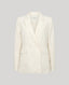Front view of the fitted double breasted Corine Stripe Cotton Linen Jacket In Taupe. 