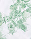 Close-up of the Ella Tie Skirt in Tropical Green, featuring the floral design. 
