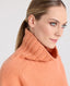 Cashmere Blend Chunky Roll Neck Jumper, Soft Orange | Really Wild Clothing | Studio Model Close up