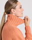 Cashmere Blend Chunky Roll Neck Jumper, Soft Orange | Really Wild Clothing | Studio Model Collar Detail