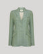 Jackie check tweed jacket in sea green, front-facing product shot showcasing structured tailoring, notched lapel and checkered pattern. 