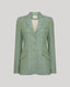 Jackie check tweed jacket in sea green, front-facing product shot showcasing structured tailoring, notched lapel and checkered pattern. 