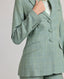 Jackie Check tweed jacket in sea green, mid-length view showcasing the buttoned front, lapel and sleeve detail