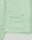 Pocket detail of the Gabrielle Wool Tweed BouclÃ© cropped Jacket in Green.