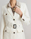 Notched collar detail of the Meryl belted Safari Jacket In White with safari styled pockets, branded tortoiseshell buttons and tonal stab stitching.