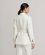 Back view of model wearing the Meryl Safari Jacket In White.