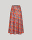 Front view of the Sidney Paisley Midi Slip Liberty Silk Skirt in Fiery Red Orange, featuring a bold and feminine paisley design.