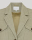 Safe green safari jacket with brand label on a white background
