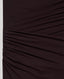 Close-up of brown pleated fabric on long sleeved wrap dress 