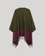A colorblock cape with a dark olive green upper section and a deep purple lower section with fringe, shown against a solid light gray background.