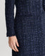 Close-up of Model wearing Audrey BouclÃ© Belted Coat in Midnight Navy Blue