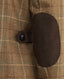 Close-up of Alcantara elbow patches and leather buttons on the Balmoral Tweed Country Jacket in Chestnut Brown Check 
