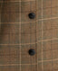 Close-up of leather buttons on the Balmoral Tweed Country Jacket in Chestnut Brown Check 