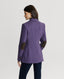 Model wearing Barnsley Merino Wool Jacket in Purple showing elbow patches.