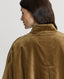 Back of Model wearing the Beaufort Reversible Tweed and Velvet Cape with the gold velvet side showing.