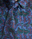 Close-up on the birch Print Silk Detachable Tie Neck Blouse in Midnight Blue 