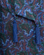 Close-up on tie-belt detail with a tassel on Birch Print Silk Shirt Dress in Midnight Blue, Oxblood Red and Loden Green