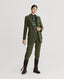 Model wearing Blenheim Tweed Country Jacket in Moss Green Check with tweed trousers 
