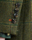 Close-up on button details on cuff of Blenheim Tweed Country Jacket in Moss Green Check 