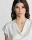 Close-up of Model wearing Chester Silk Cowl Neck Blouse in Winter Ivory 
