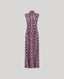 Butterfly patterned dress on a light gray background