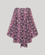 Butterfly patterned dress on a light gray background
