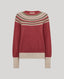 A crewneck knit sweater in a dusty rose red color, featuring a Fair Isle style patterned yoke in cream, olive green, and red, with solid cream ribbed cuffs and hem.